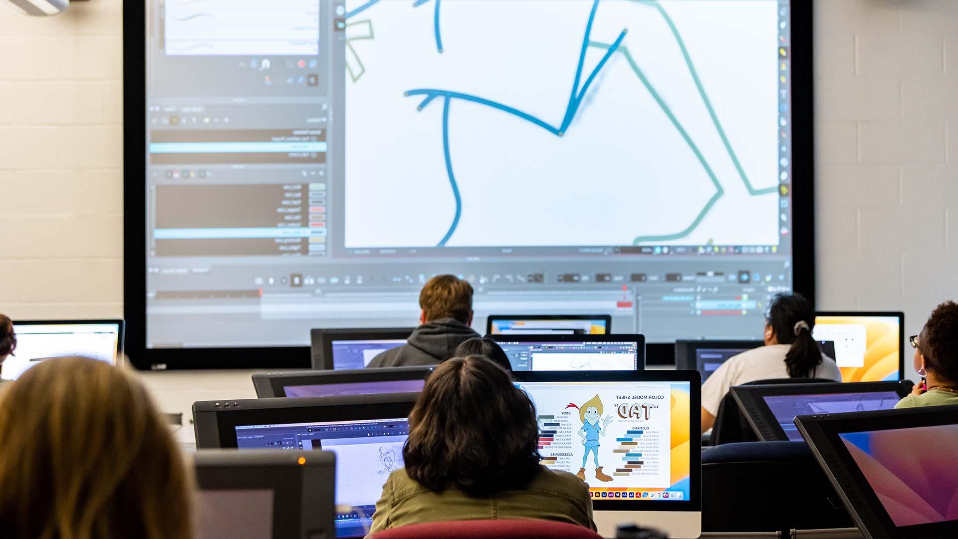  /动画学生在计算机实验室听讲座. 